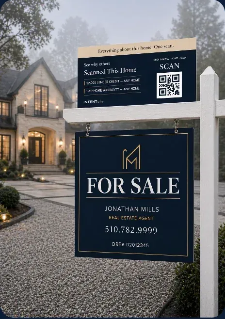 For-sale sign with an INTENTah scan panel outside a home